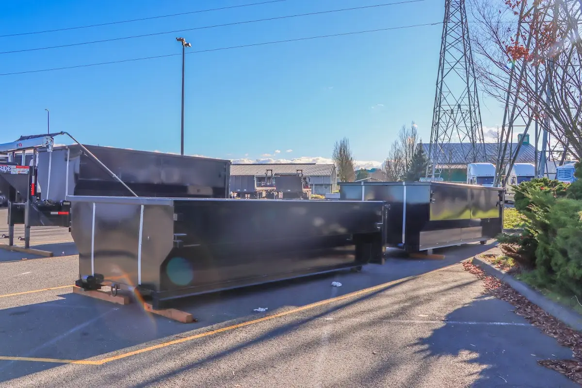 Roll-off dumpster ready for waste disposal at job site for 2 Yard Dumpster Rental in Fairmont